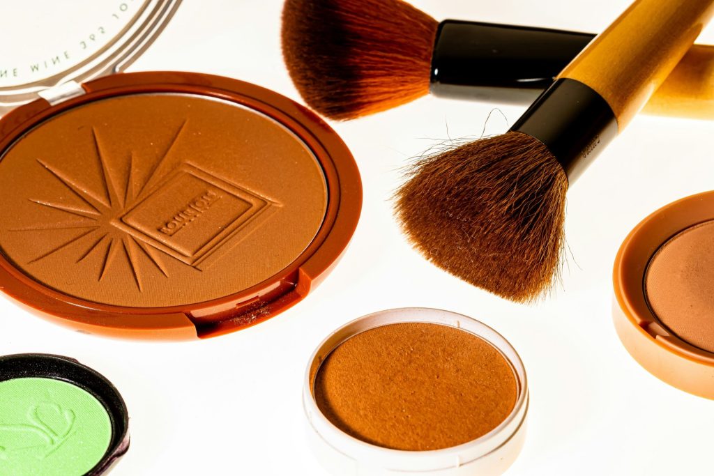 brown and black makeup brush