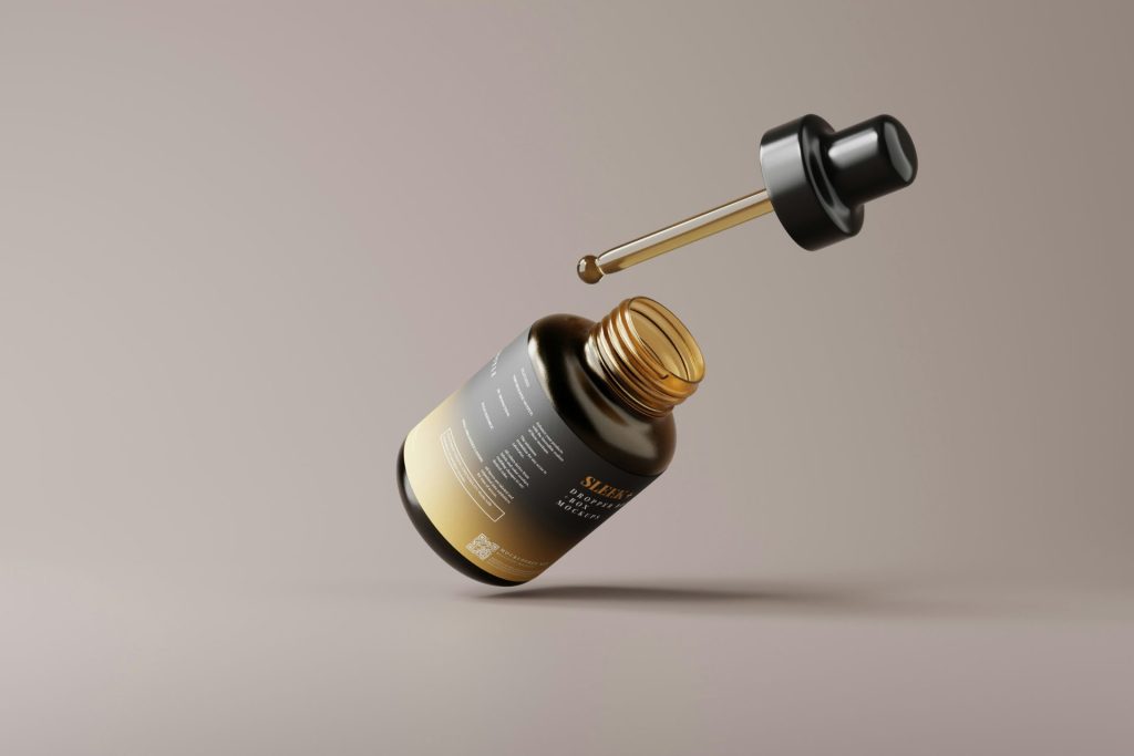 a dropper bottle with a dropper on top of it